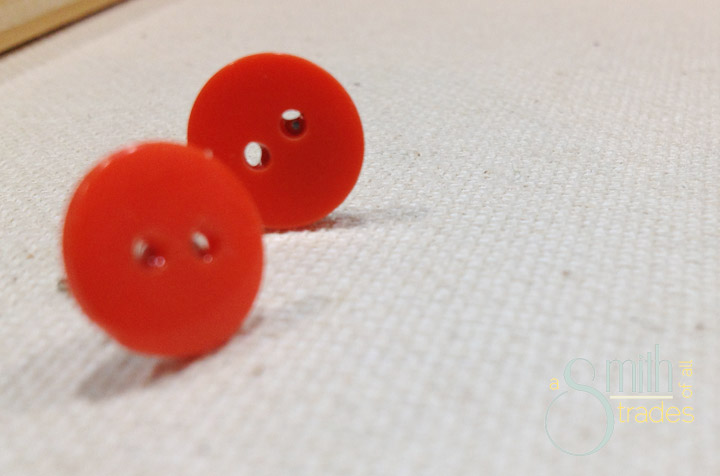 orange button earrings
