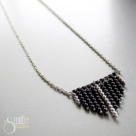 {A Smith of All Trades} Geometric Necklace